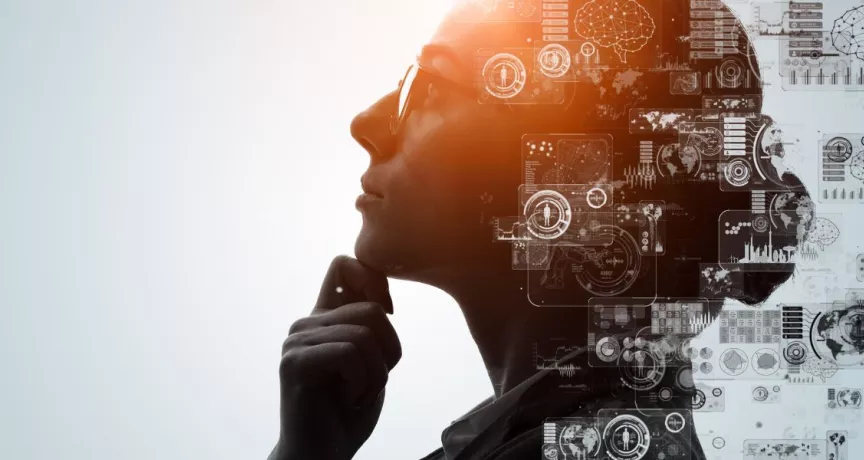 Profesional reflexionando sobre el impacto de la inteligencia artificial, con visualizaciones digitales, gráficos y datos tecnológicos superpuestos que representan la transformación del trabajo y la innovación empresarial.